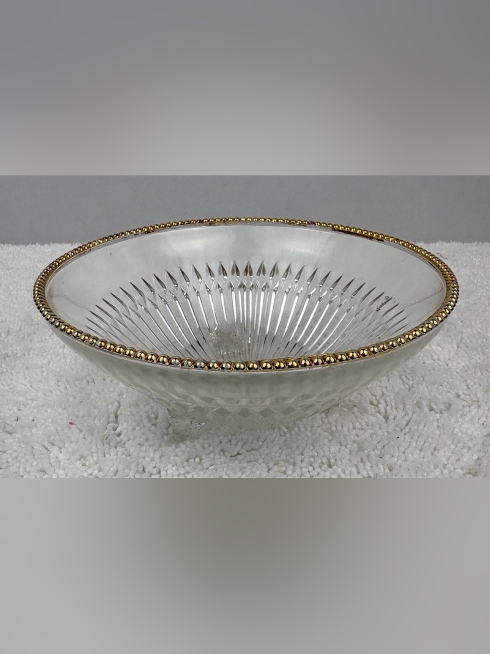 Vintage Jeannette Glass Co. Three-Footed Bowl which Features a Ribbed Design